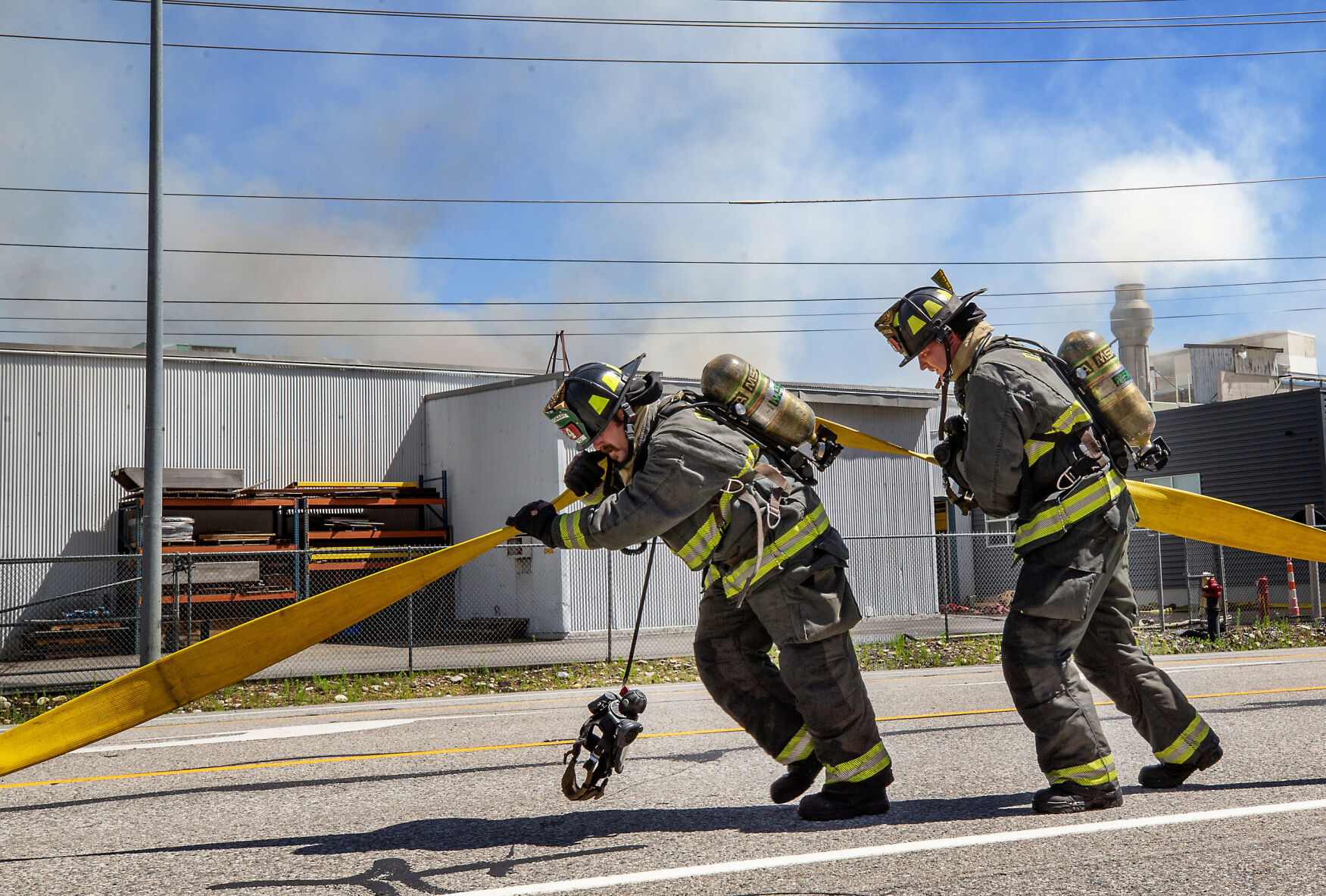 SPNW_5096795162_LayingDownHosesAtPaperFire.jpg